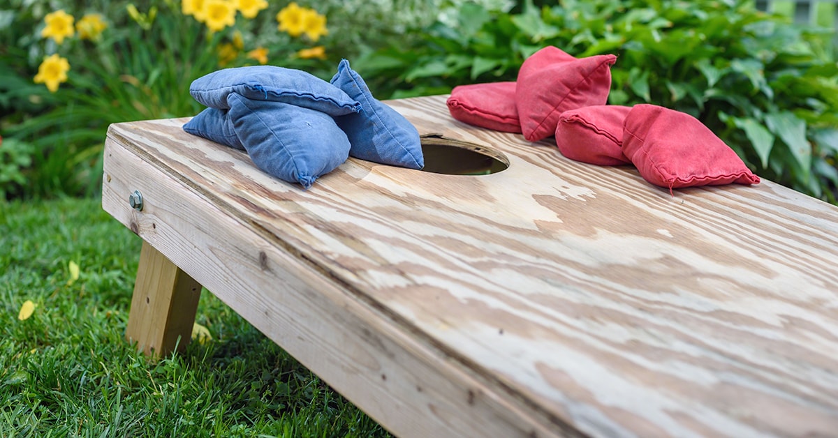 Wood cornhole game board