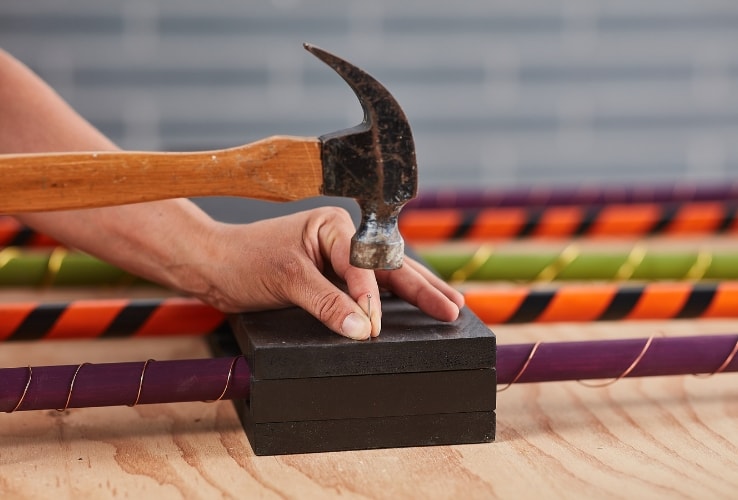 Person assembling a DIY Halloween decoration