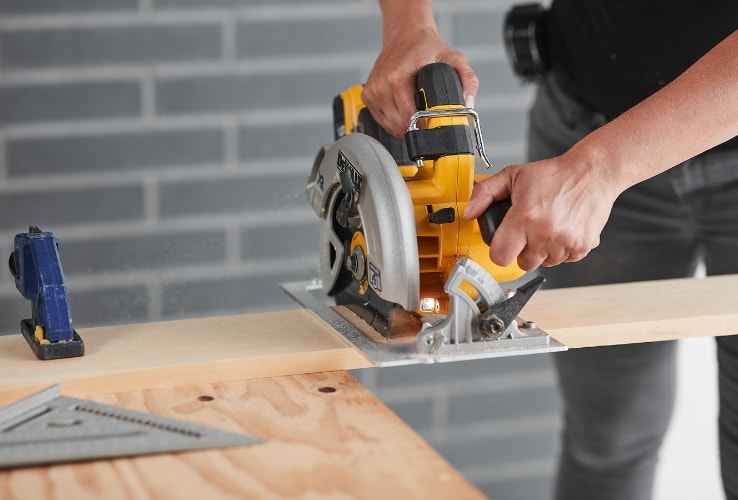 Person using a circular saw