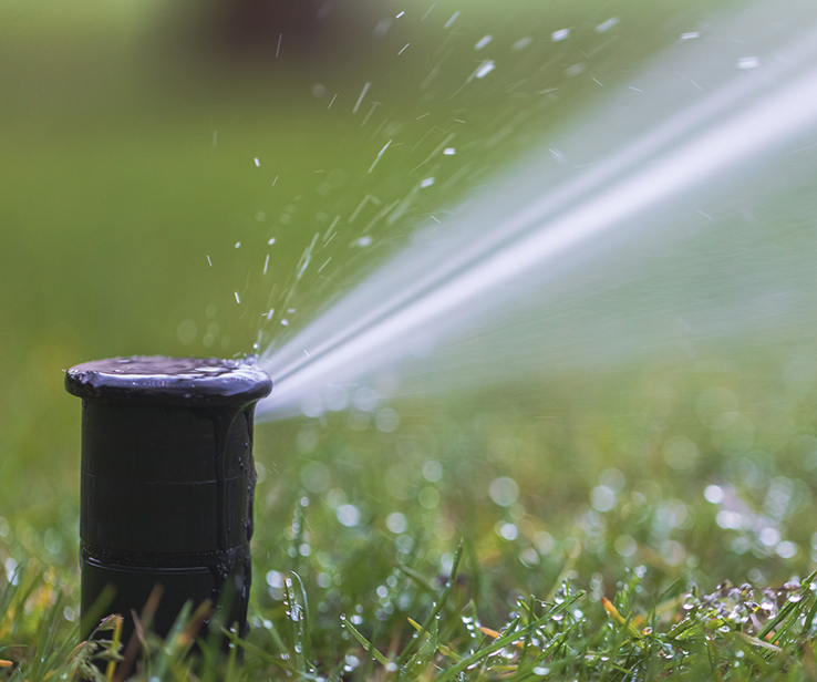 Underground automatic lawn sprinkler