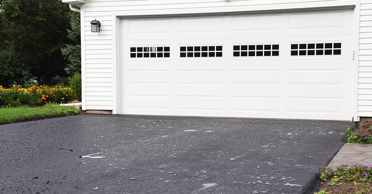 Freshly sealed asphalt driveway