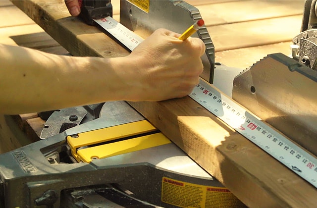 Measuring the board before cutting