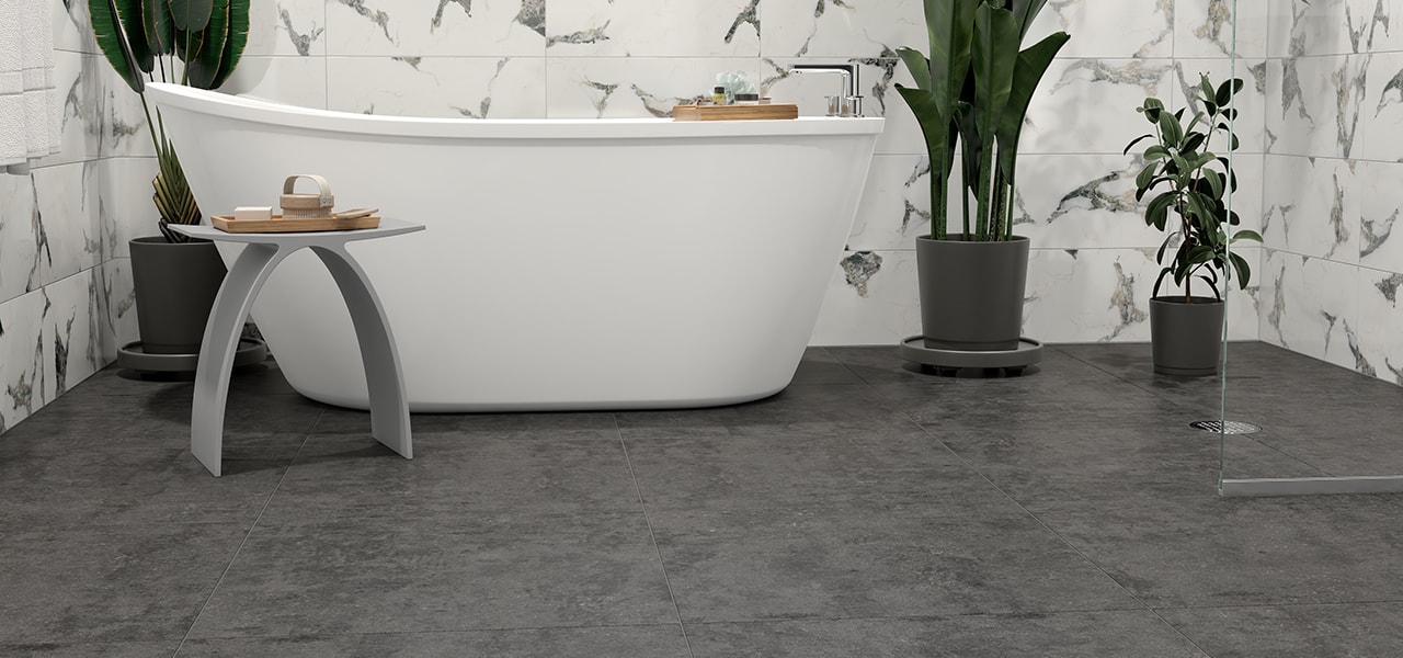 Bathroom with dark grey tile flooring