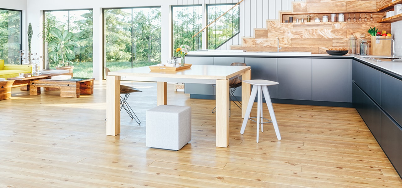 Kitchen with matte hardwood flooring