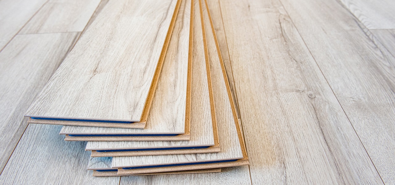 Light grey laminate flooring planks