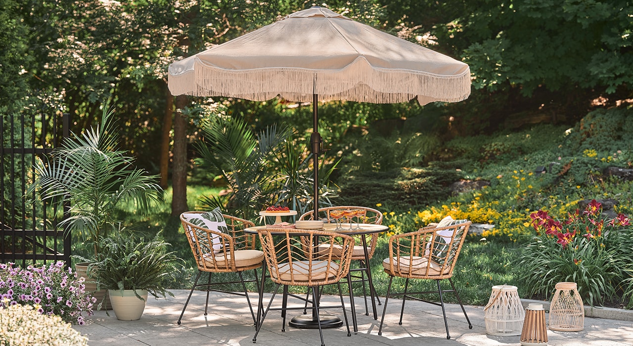 Patio set with a large beige umbrella