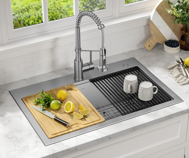 Cutting board and colander on a sink