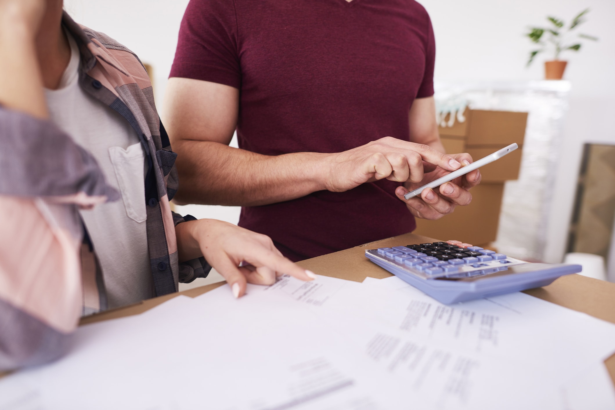 Couple calculating a budget