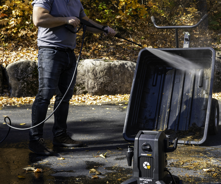 Person using a pressure washer 