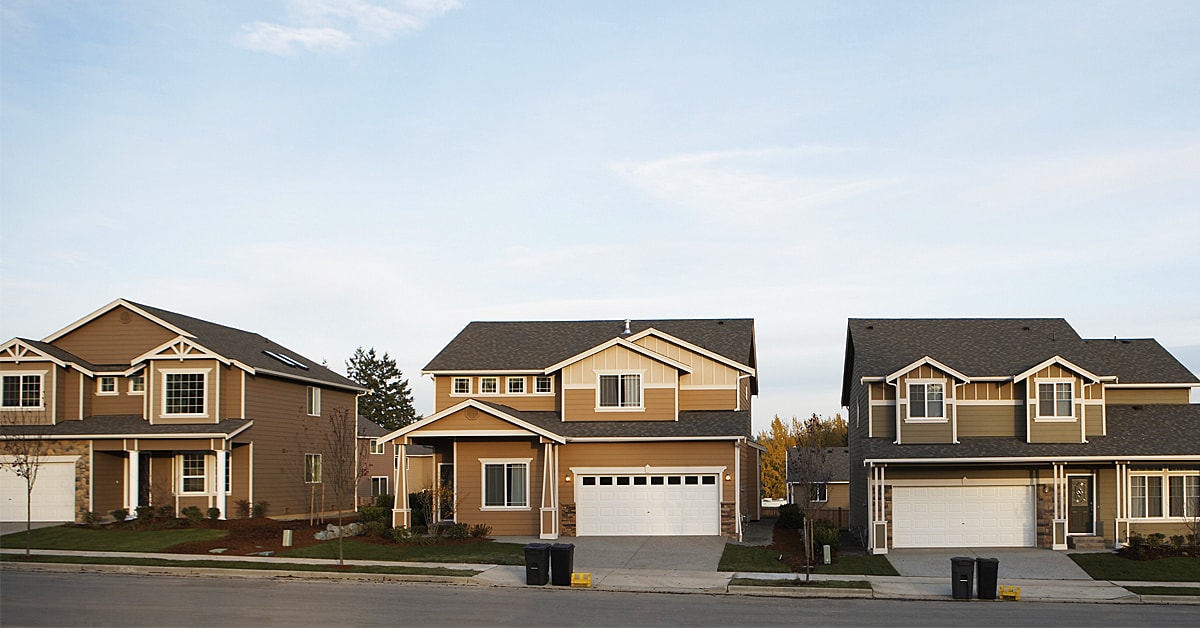 Street with three houses