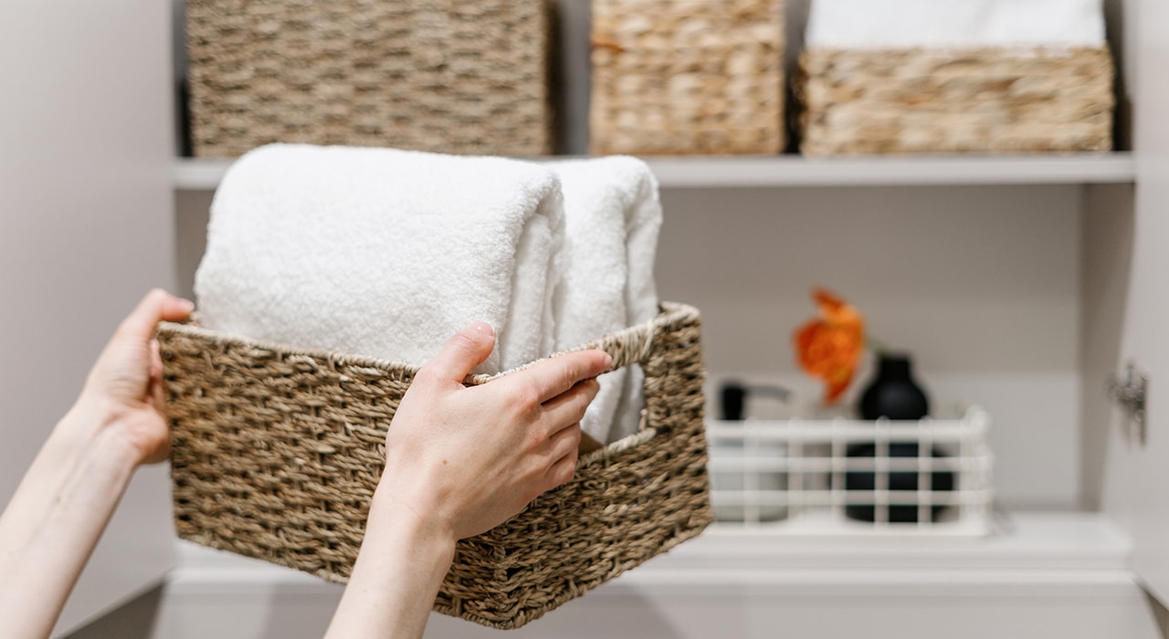 Woman holding wicker baskets