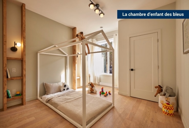 Une chambre d’enfants avec un lit en forme de maison