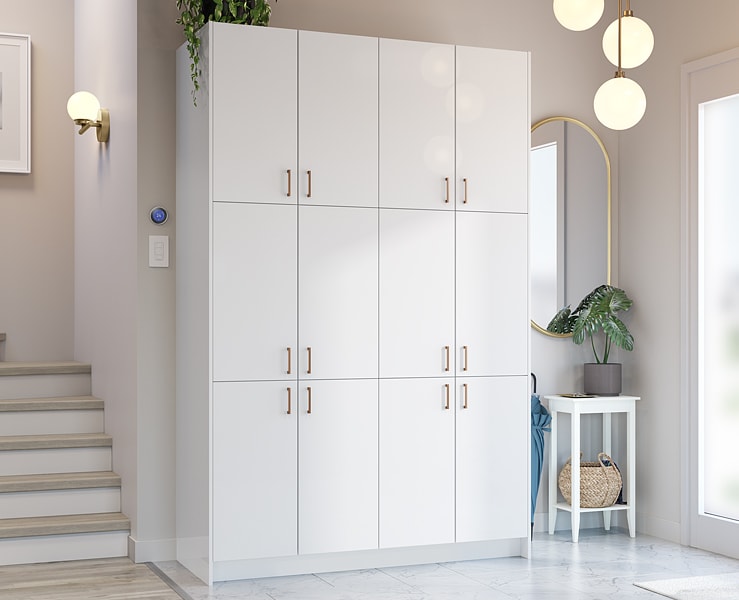 Set of white cabinets with brass pulls 