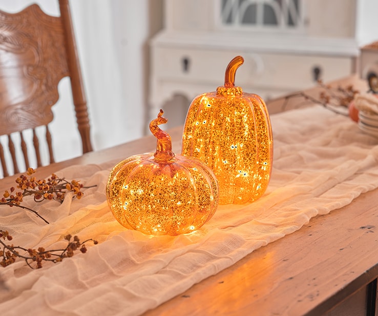 Set of two pre-lit pumpkins