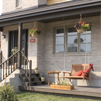 Window with brick exterior cladding